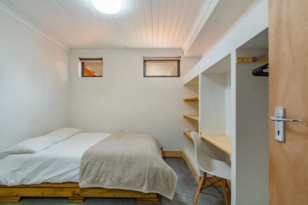 Kana Huis 4-12 House 4, Kana Guest Farm – self-catering group stay in Stellenbosch with modern kitchen, lounge, pool & jacuzzi access.