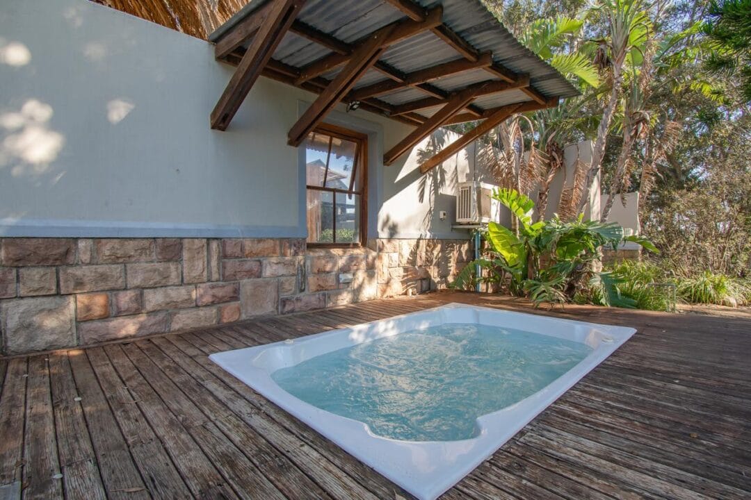 Kana Huis 4-6 House 4, Kana Guest Farm – self-catering group stay in Stellenbosch with modern kitchen, lounge, pool & jacuzzi access.