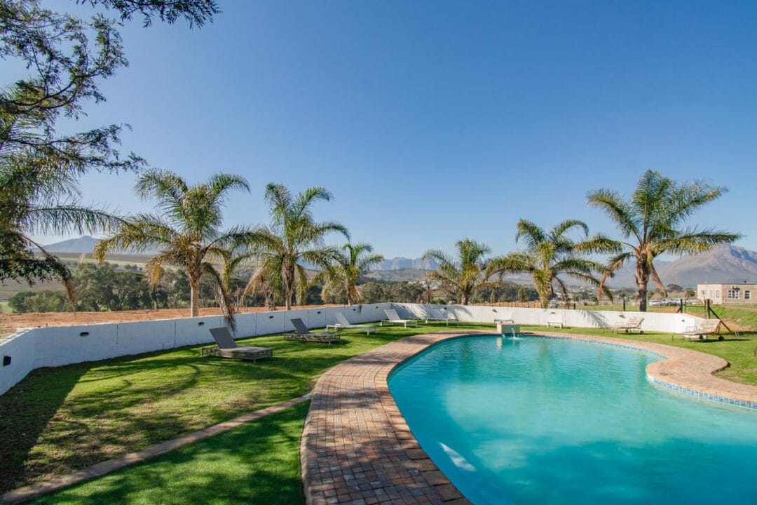 Kana Huis 4-7 House 4, Kana Guest Farm – self-catering group stay in Stellenbosch with modern kitchen, lounge, pool & jacuzzi access.
