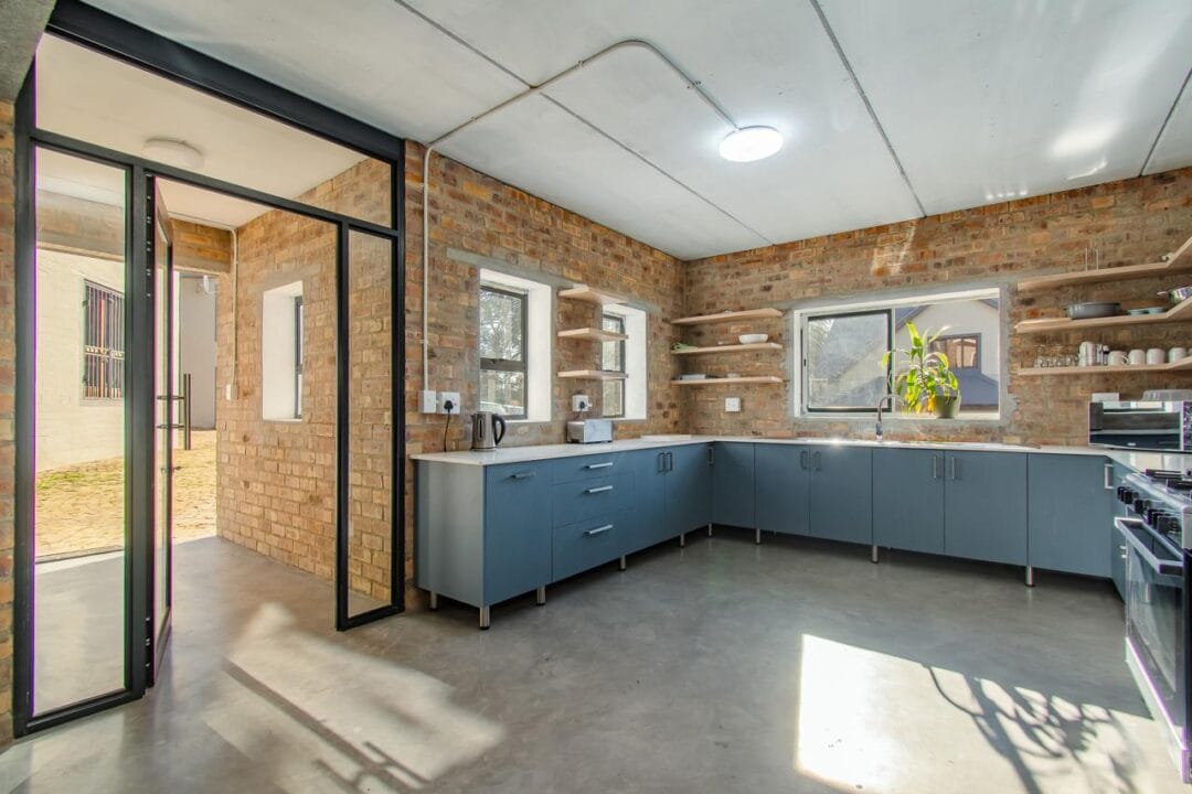 Kana Huis 4-9 House 4, Kana Guest Farm – self-catering group stay in Stellenbosch with modern kitchen, lounge, pool & jacuzzi access.